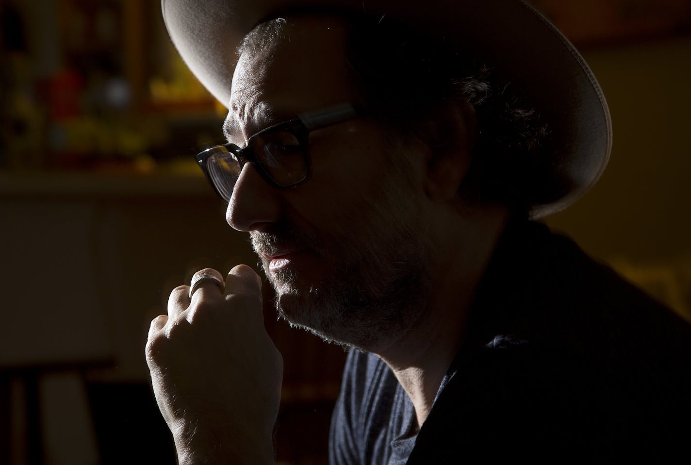 Adam Levy photographed in his Minneapolis home. ] CARLOS GONZALEZ &#xef; cgonzalez@startribune.com - November 17, 2015, Minneapolis, MN, Some of the promotional appearances Honeydogs front man Adam Levy has done for his new album has been a Yale psychiatry seminar and the Twin Cities Jewish Mental Health Conference. The record, "Naubinway," reflects on the loss of his son to mental illness and suicide.