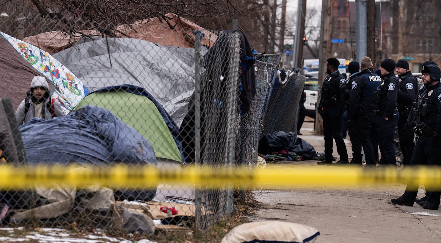 Police arrive ahead of the shutdown of Camp Nenookaasi in Minneapolis, Minn., on Thursday, Jan. 4, 2024. The City of Minneapolis is planning to clear out the large homeless encampment over public safety and health concerns. ] RICHARD TSONG-TAATARII • richard.tsong-taatarii @startribune.com