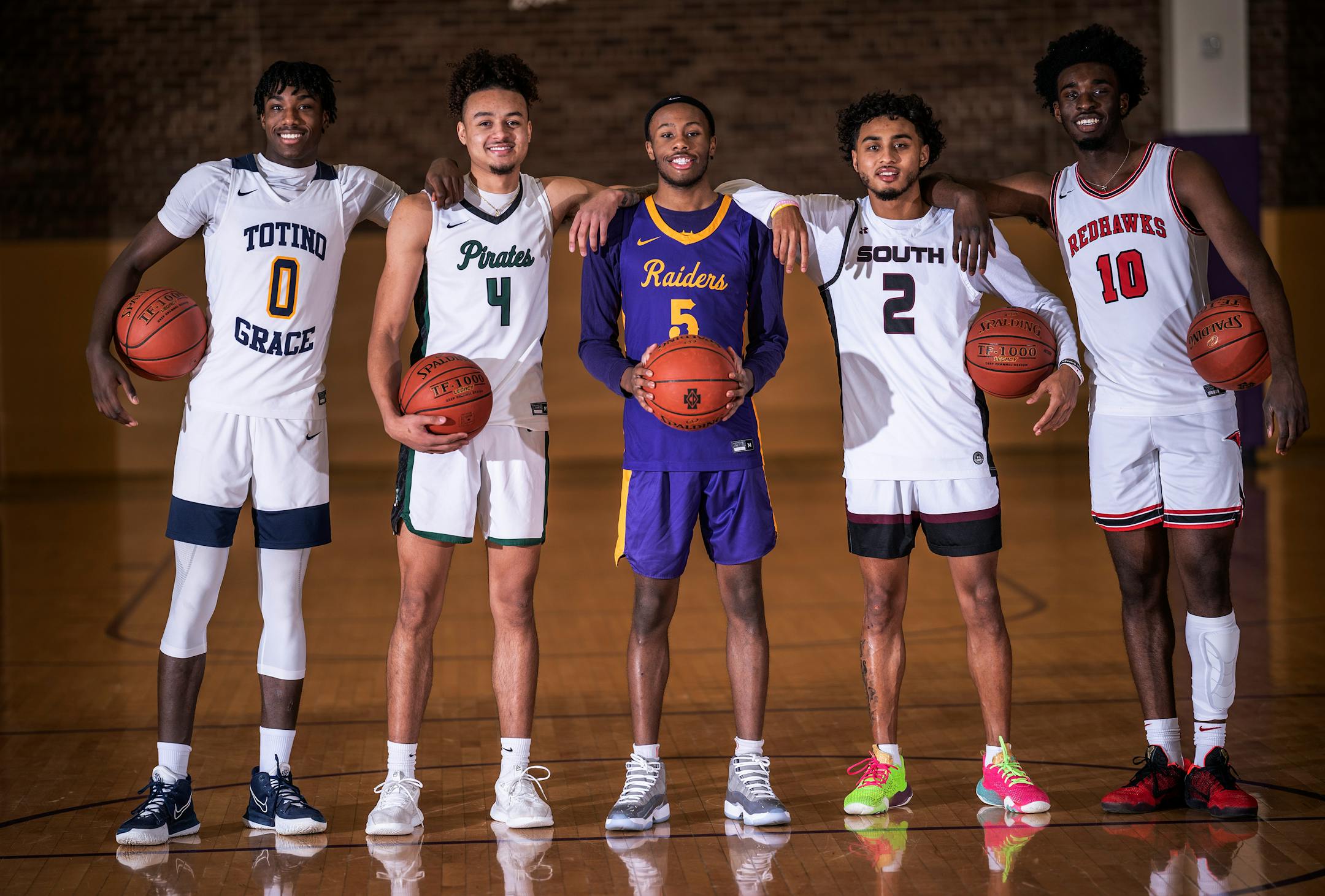 Metro Players of the year left to right , Demarion Watson,Totino Grace , Braeden Carrington,Park Center, Tre Holloman, Cretin-Derham Hall (player of year), Alonzo Dodd-,South High, and Prince Aligbe Minnehaha Academy in St. Paul, Minn., on Sunday, March 13, 2022.