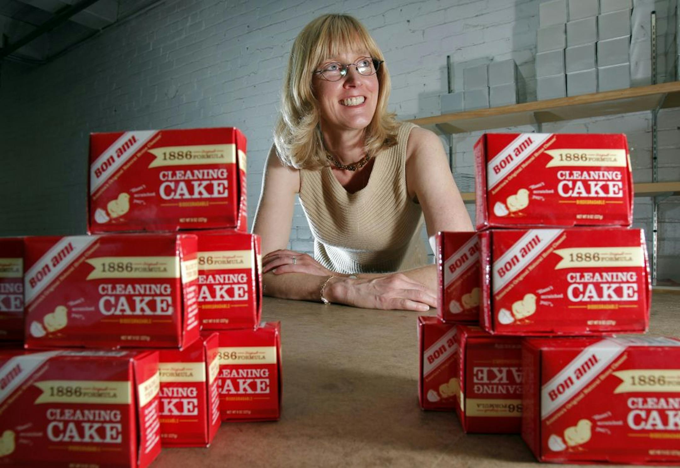 The Bon Ami company is celebrating its 125th anniversary, and has recently reissued its cleaning cake with its original 1886 formula. Carolyn Beaham West, vice president of brand development for the company, sits amid the company's cleaning cake.