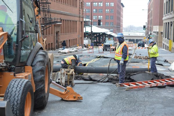 Water main break in downtown St.Paul on Wall St. between 5th and 6th Streets near the Farmer's Market.