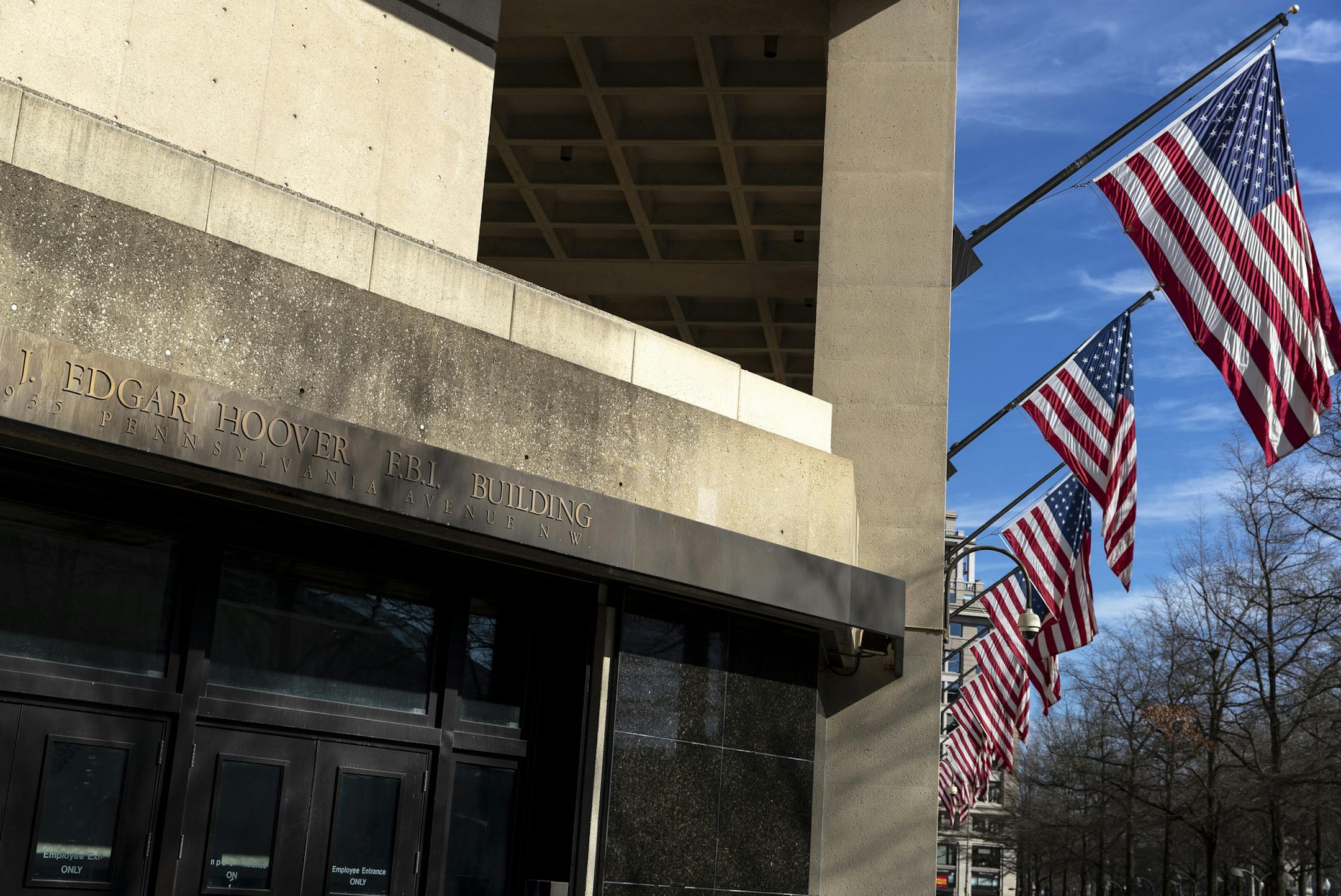 FILE -- The J. Edgar Hoover Building, where the FBI is headquartered, in Washington, on Feb. 17, 2020. The number of people targeted for court-approved surveillance by counterterrorism and counterintelligence investigators in 2019 plunged to its lowest level in at least seven years, a drop that coincided with intense scrutiny on the FBI&#x2019;s use of its national-security wiretapping power in the Trump-Russia investigation. (Anna Moneymaker/The New York Times)