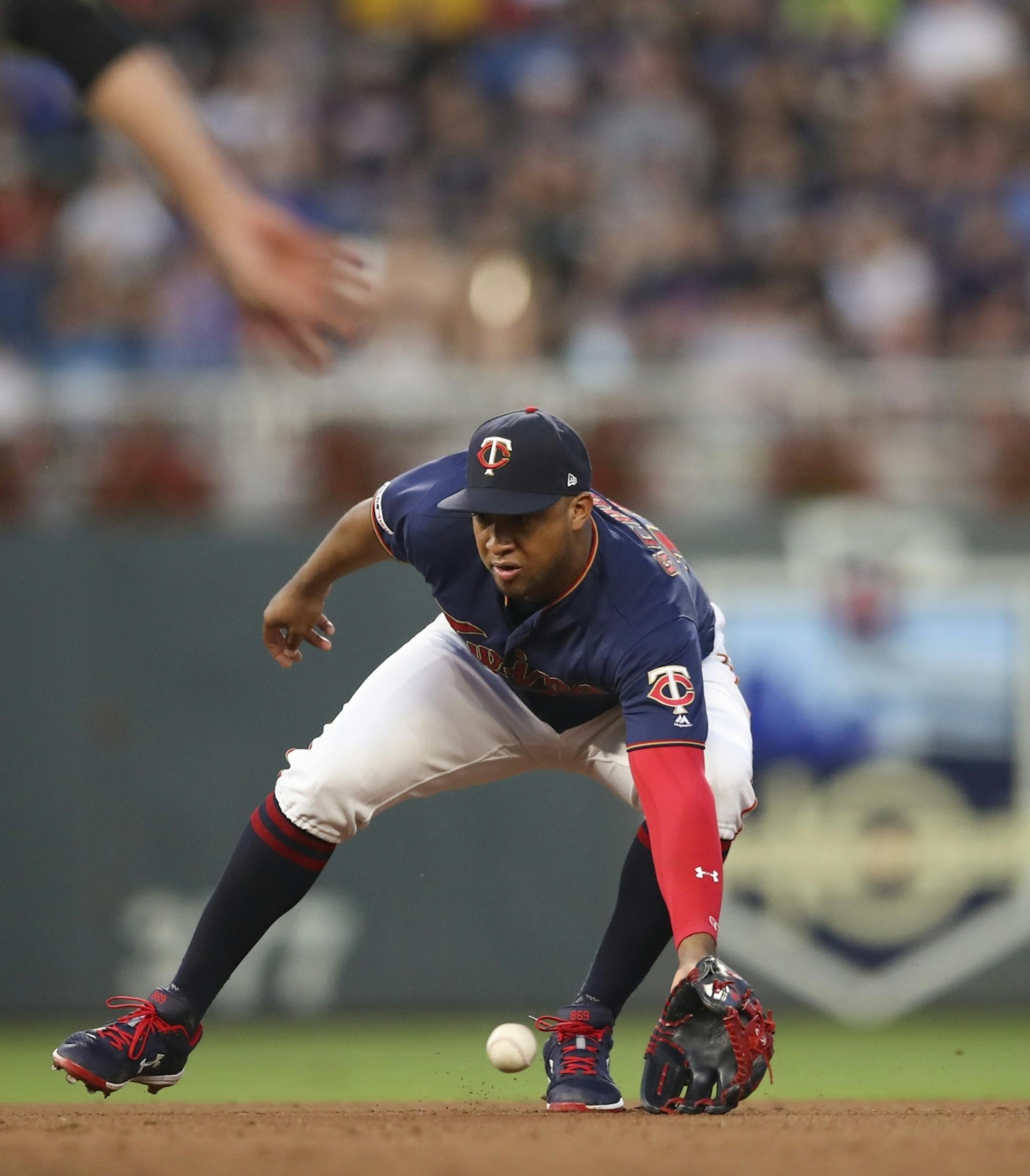 Minnesota Twins designated hitter Nelson Cruz (23) fielded a fourth inning grounder by Yankees first baseman DJ LeMahieu. LeMahieu reached on a fielder's choice.