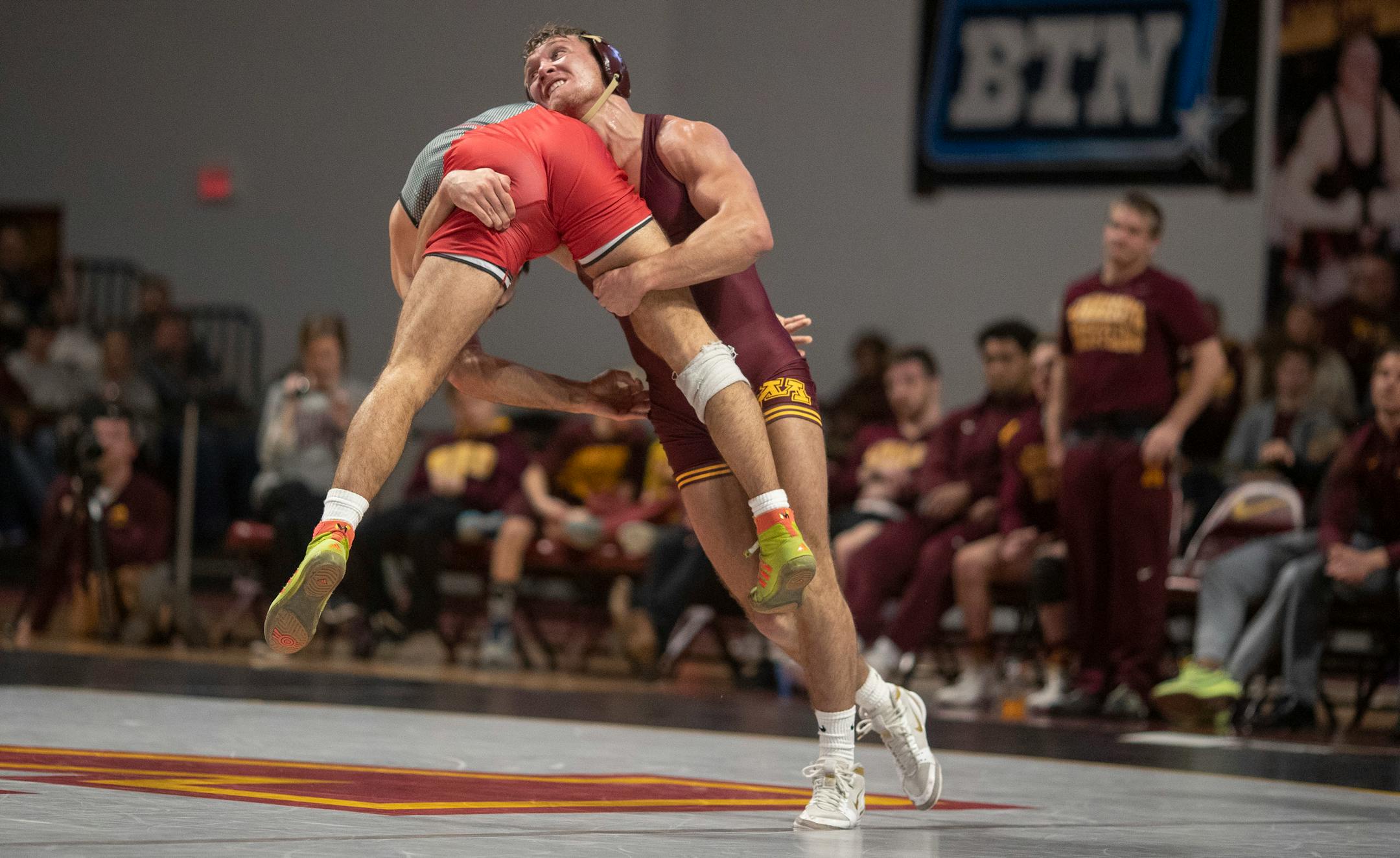 Devin Skatzka (right, shown in a January match against Rutgers) and the Gophers rode seven bonus-point victories and two pins to its first Big Ten shutout in seven years, 45-0 over Maryland on Sunday at Maturi Pavilion. Skatzka recorded a technical fall at 174 pounds.