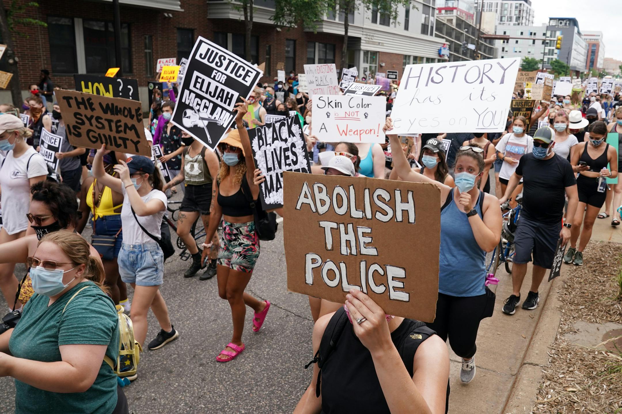 Black Lives Matter supporters marched in protest against the police killing of Elijah McClain, a 23-year-old Black man from Aurora, Colo. who was killed after an encounter with police while walking home in late August, Saturday through downtown Minneapolis. ] ANTHONY SOUFFLE • anthony.souffle@startribune.com Community members gathered for a march protesting against the police killing of Elijah McClain, a 23-year-old Black man from Aurora, Colo. who was killed after an encounter with police while