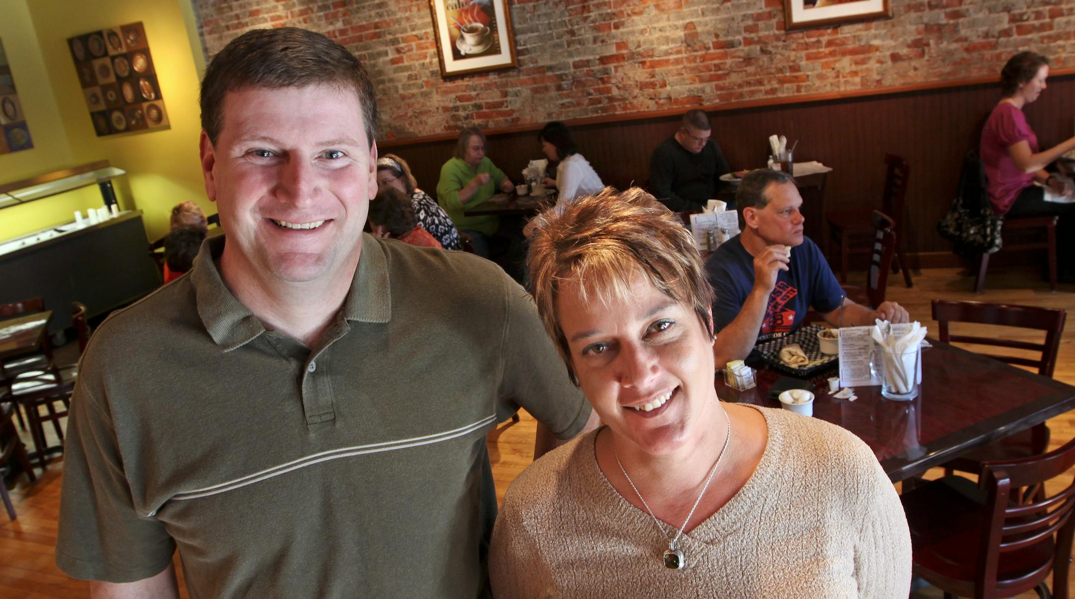 (left to right) Legal Grounds Coffee Shop Co-owners Dean Clossey and Holly Brezinka were photographed in the dining area of the downtown Anoka shop.