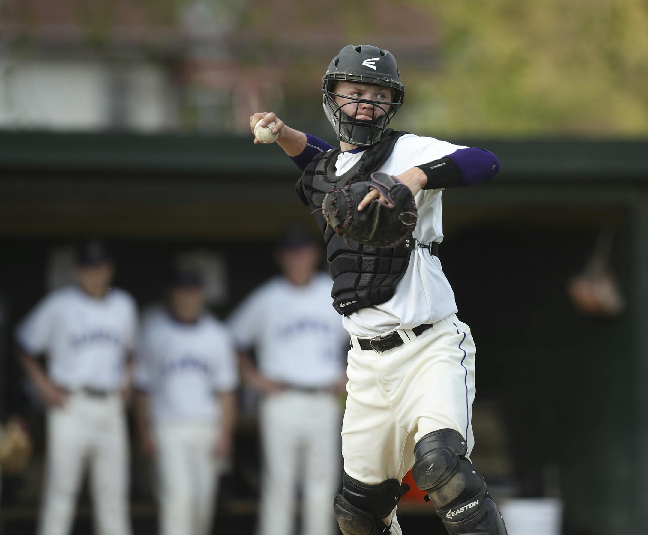 Chaska catcher Riley Swenson threw out St. Louis Park's Shea Pekarek at first base. ] JEFF WHEELER ï jeff.wheeler@startribune.com Chaska hosted St. Louis Park in a doubleheader baseball game Wednesday evening, May 9, 2018 at the Chaska Athletic Park.