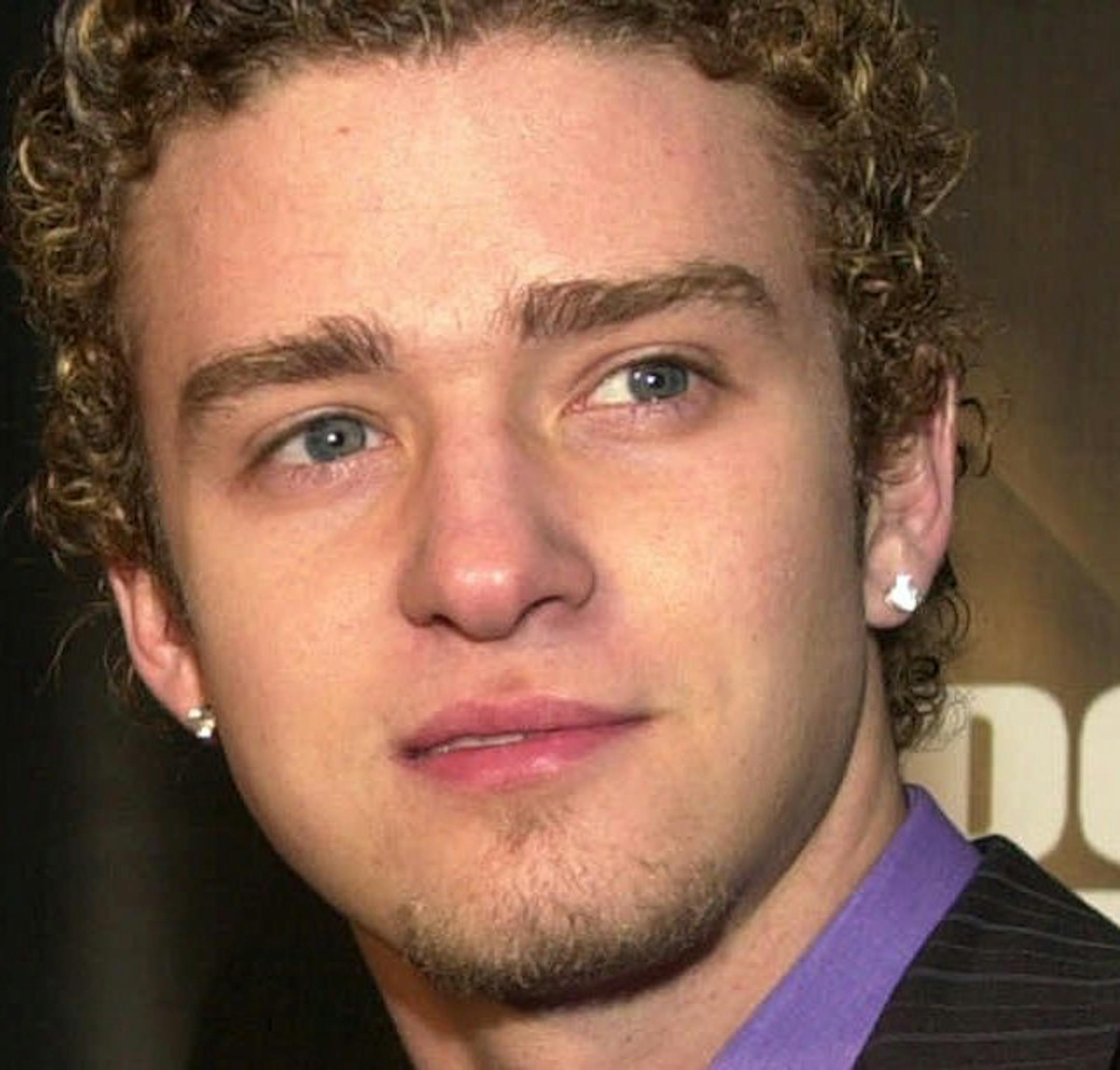 Chris Kirkpatrick, left, and Justin Timberlake from the pop group 'N SYNC arrive at the Sports Illustrated's Sportsman of the Year Awards in New York, Tuesday, Dec. 12, 2000. (AP Photo/Stephen Chernin)