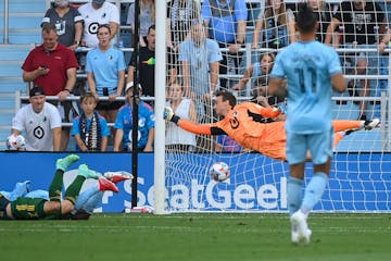 Portland Timbers forward Felipe Mora (9) scored a goal against Minnesota United goalkeeper Tyler Miller (1) in the first half.