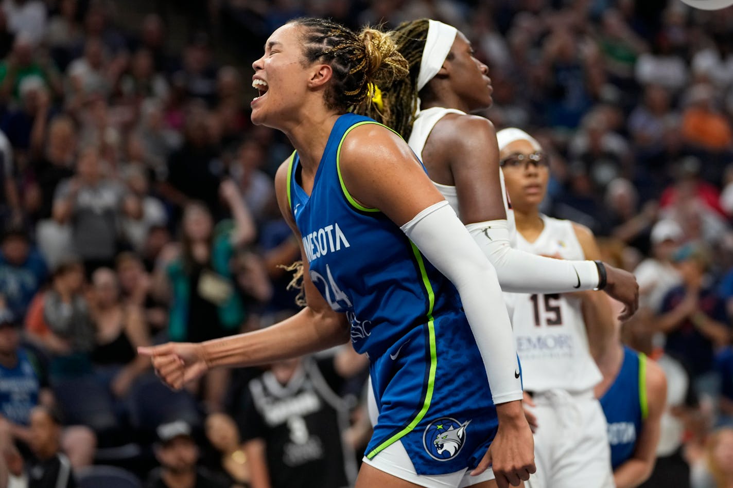 Minnesota Lynx forward Napheesa Collier celebrates after making a basket while fouled during the second half of a WNBA basketball game against the Atlanta Dream, Friday, Sept. 1, 2023, in Minneapolis. (AP Photo/Abbie Parr)