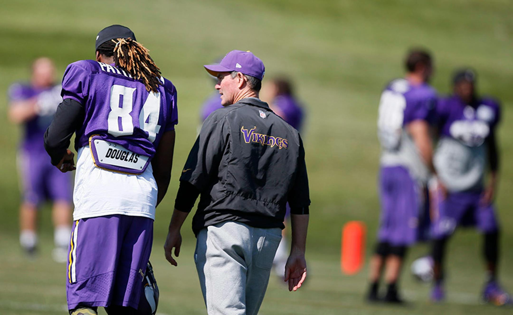 Minnesota Vikings head coach Mike Zimmer right talked with receiver Cordarrelle Patterson (84) as the team got back to practice without Adrian Peterson Wednesday September 16 , 2014 in Eden Prairie ,MN. ] Jerry Holt Jerry.holt@startribune.com