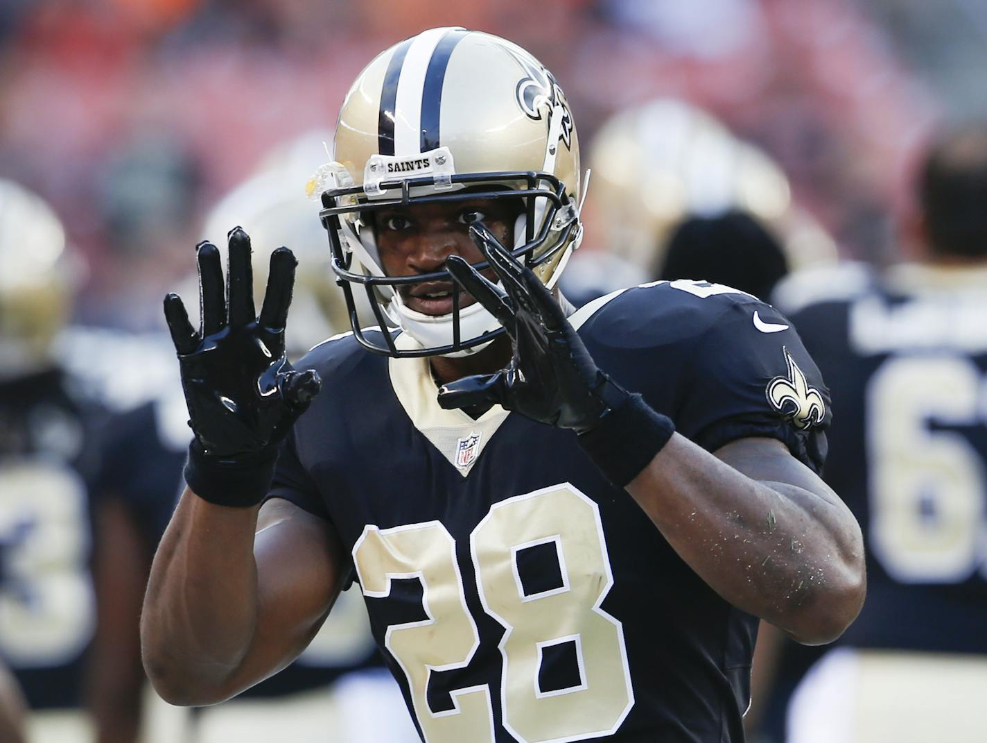 New Orleans Saints running back Adrian Peterson stands on the sideline during warm ups before an NFL preseason football game against the Cleveland Browns, Thursday, Aug. 10, 2017, in Cleveland. (AP Photo/Ron Schwane)