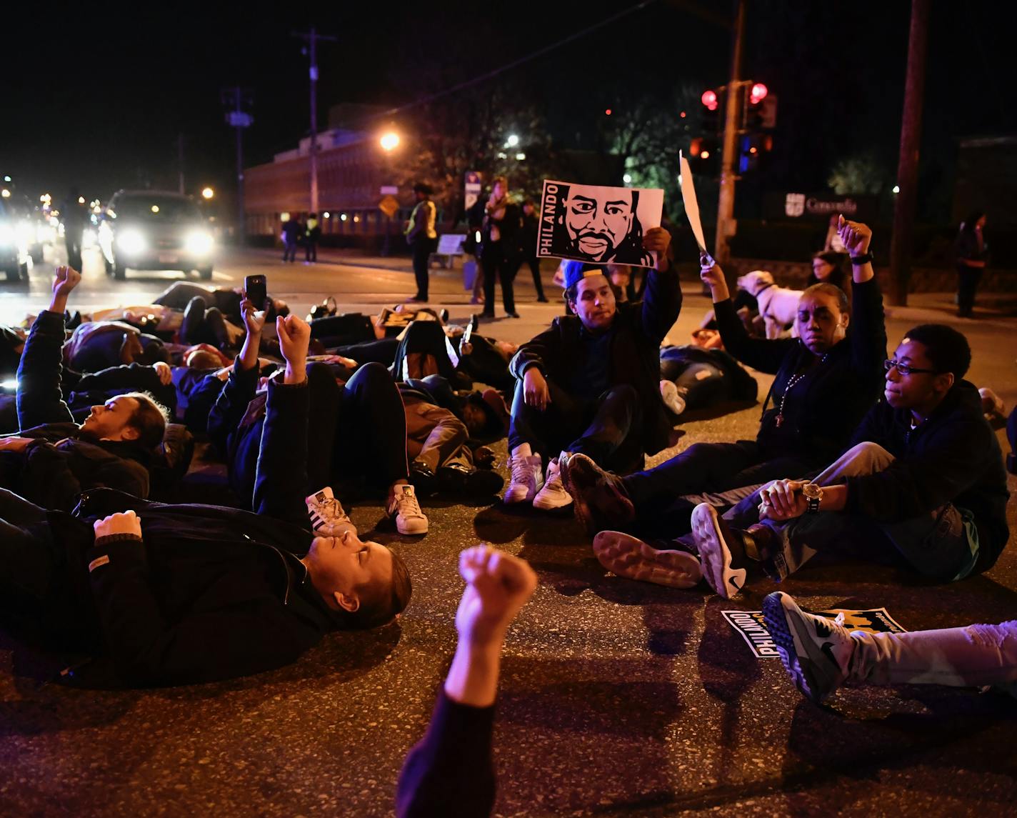 Protesters performed a die in at the intersection of Marshall and Hamile Aves during a march for Philando Castile ] (AARON LAVINSKY/STAR TRIBUNE) aaron.lavinsky@startribune.com