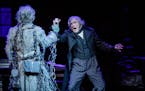 John Catron as Marley and Nathaniel Fuller as Scrooge in "A Christmas Carol" at the Guthrie Theater.