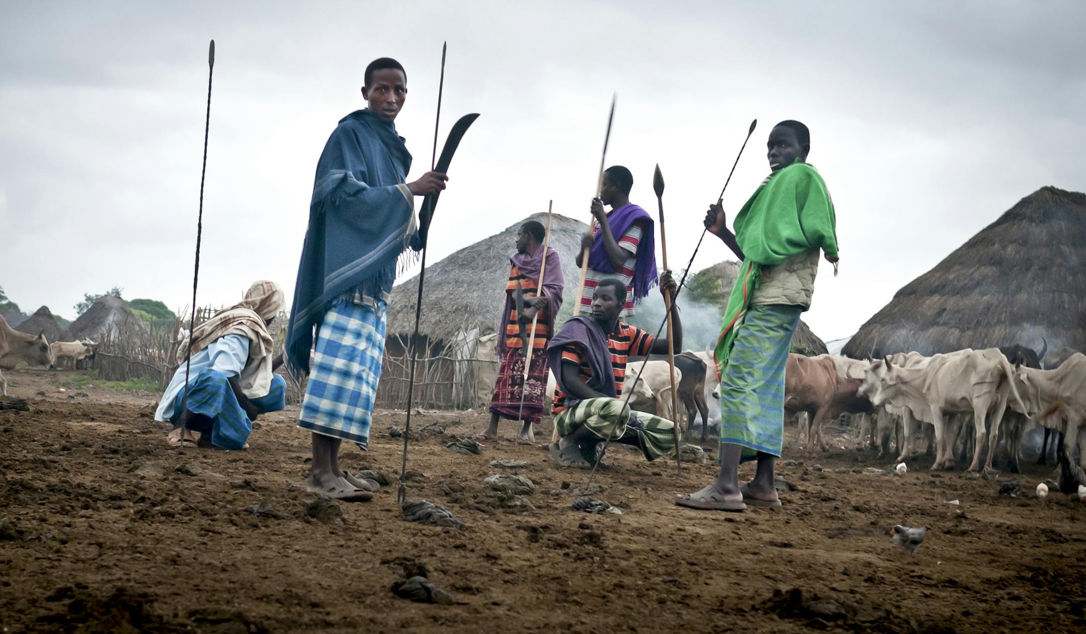Orma men patrol the village of Handaraku in the Tana River Delta in shifts, fearful of possible Pokomo attacks, in Kenya, Jan. 24, 2013. Every five years or so when elections come barreling in, this stable and typically peaceful country suffers a frightening transformation in which age-old grievances get stirred up, ethnically based militias are mobilized and neighbors start killing neighbors. (Jonathan Kalan/The New York Times)
