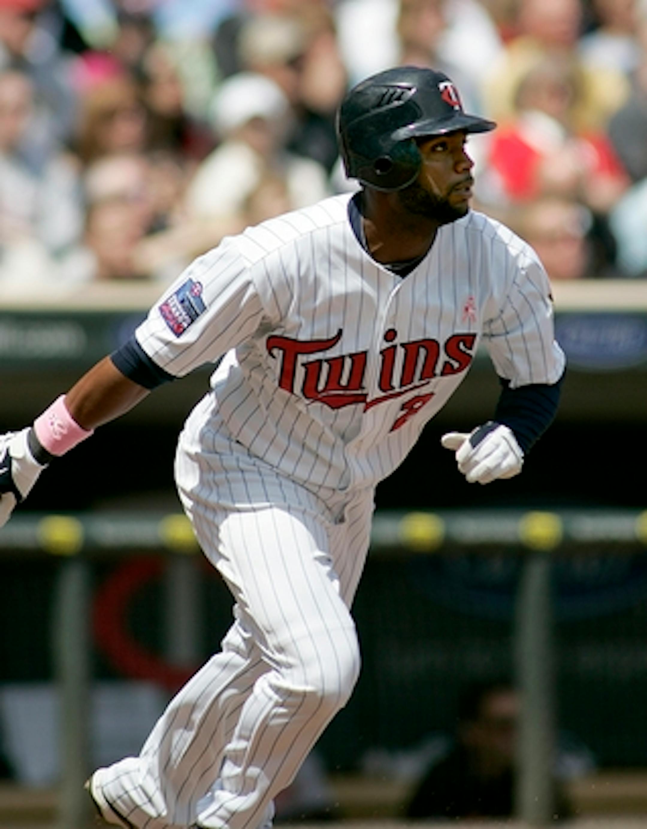 Minnesota Twins' Denard Span watches his three-run single in the fourth inning against the Baltimore Orioles in a baseball game Sunday, May 9, 2010, in Minneapolis. (AP Photo/Andy King)
