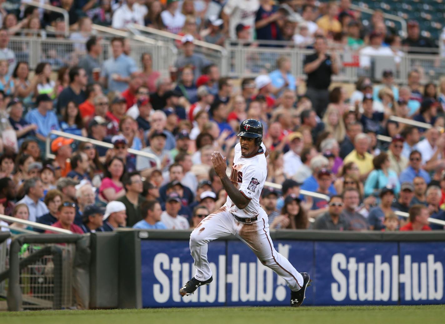 Twins center fielder Byron Buxton headed for home, scoring from second base on a Brian Dozier single in the first inning Monday night at Target Field. Buxton, in the leadoff spot for the first time, doubled to start the inning.