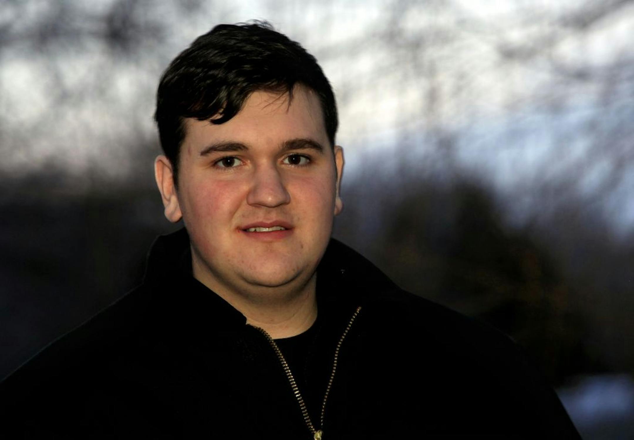 Geoff Racette, 20, found the woman whose car went into a shallow pond on the evening of Friday, Jan. 11. He was bicycling home from work on Jan. 12 when he spotted the vehicle.