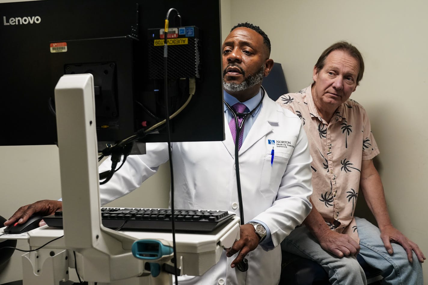 Cardiologist Kelly McCants sees patient Tim McIntosh, 57, in Louisville. McIntosh says his parents both had heart issues and his father died at 39. "I'm surprised I made it as long as I have," he says. MUST CREDIT: Washington Post photo by Jahi Chikwendiu