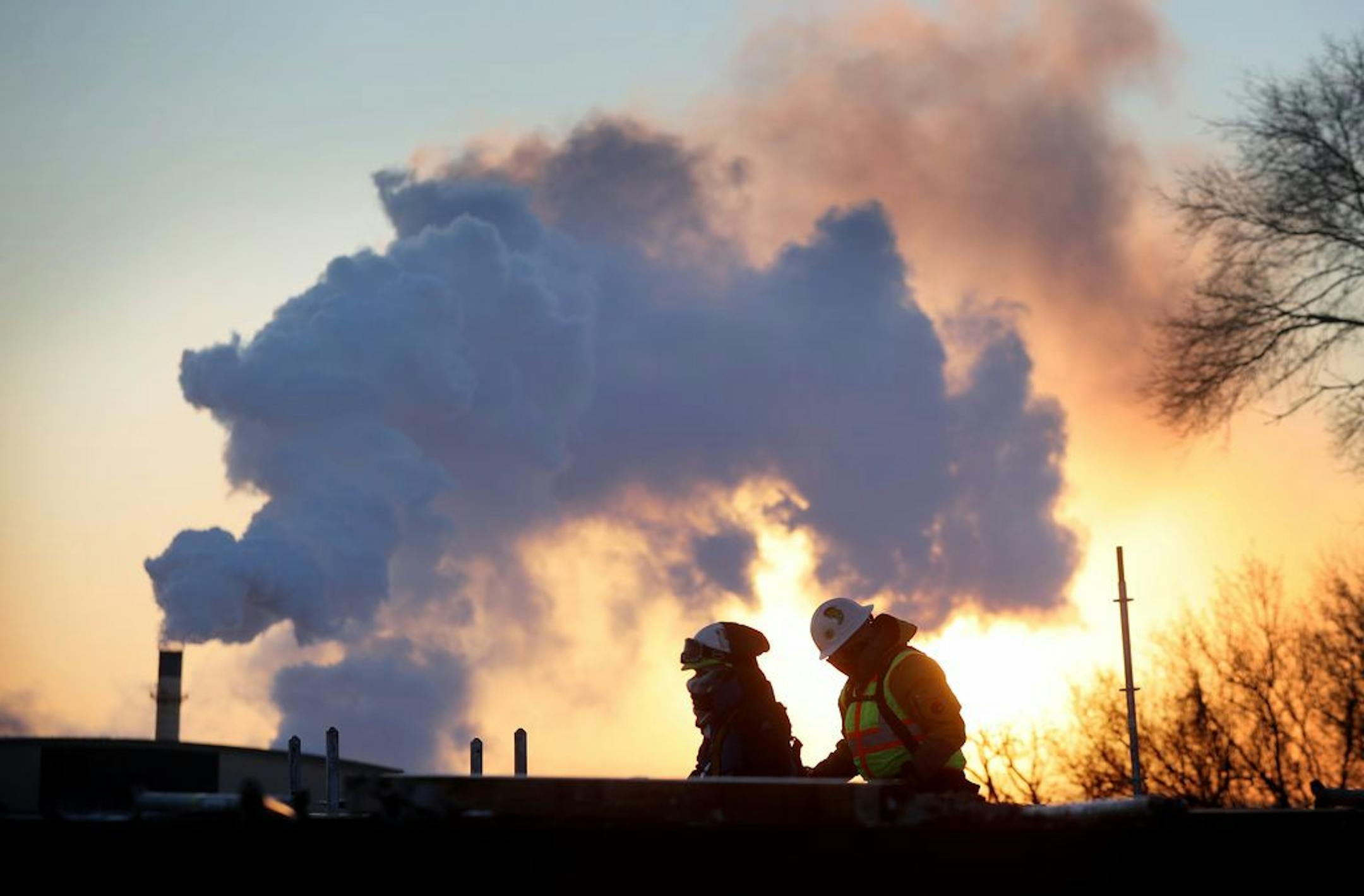 Steam rises from an Xcel Energy power plant in St. Paul.