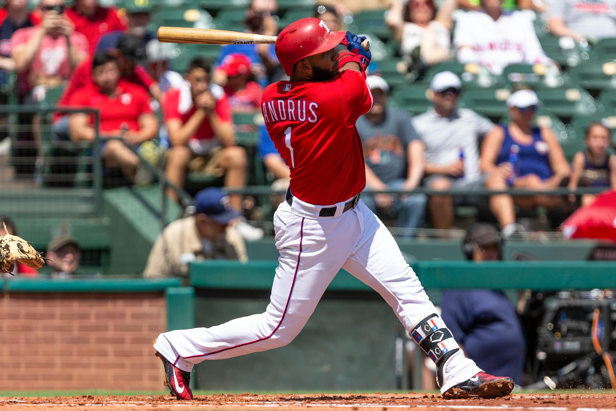 Texas Rangers' Elvis Andrus (1) hits a two-run home run during the first inning of a baseball game against the Minnesota Twins, Sunday, Sept. 2, 2018, in Arlington, Texas. (AP Photo/Sam Hodde)
