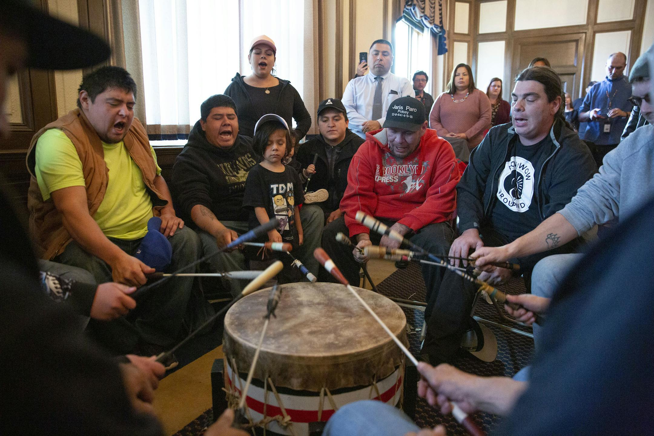 Members of the Cedar Creek Drum Group performed traditional songs during the flag presentation ceremony. ]
ALEX KORMANN • alex.kormann@startribune.com The Fond du Lac indigenous people were officially welcomed to City Hall with a flag raising ceremony. The tribal flag will now be displayed prominently in Council Chambers.