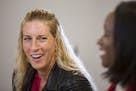 Philanthropist Erika Binger, left, and Satin Taylor Huff, whom Binger mentored 15 years ago at Boys & Girls Club, have a conversation in the Star Trib