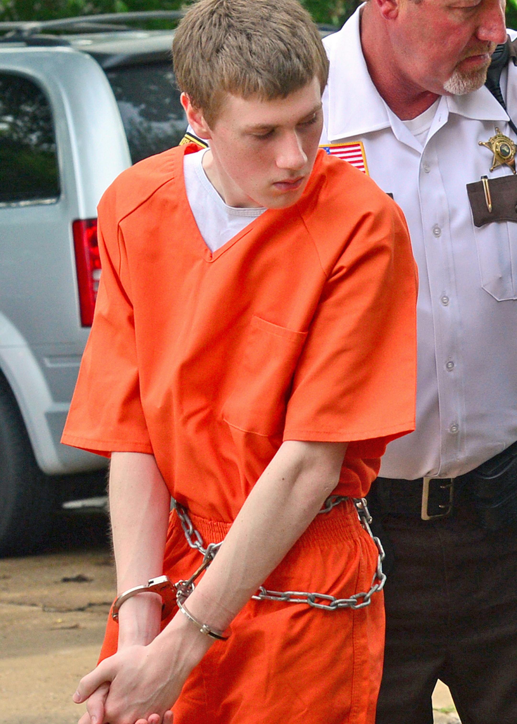 John LaDue, accused of planning an attack on his school was scheduled to make an appearance in court today Waseca County Sheriff's deputies walked him into the Waseca County Court for a morning hearing.]Richard.Sennott@startribune.com Richard Sennott/Star Tribune Waseca Minn. Wednesday 6/18/2014) ** (cq) ORG XMIT: MIN1406181043410412