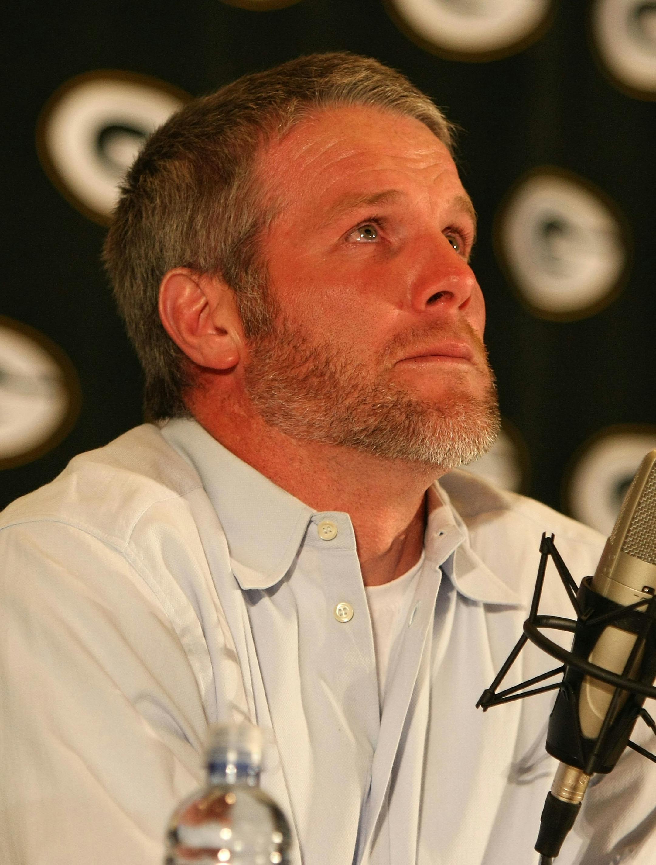 Brett Favre wept as he announced his retirement March 6 at Lambeau Field in Green Bay, Wis.