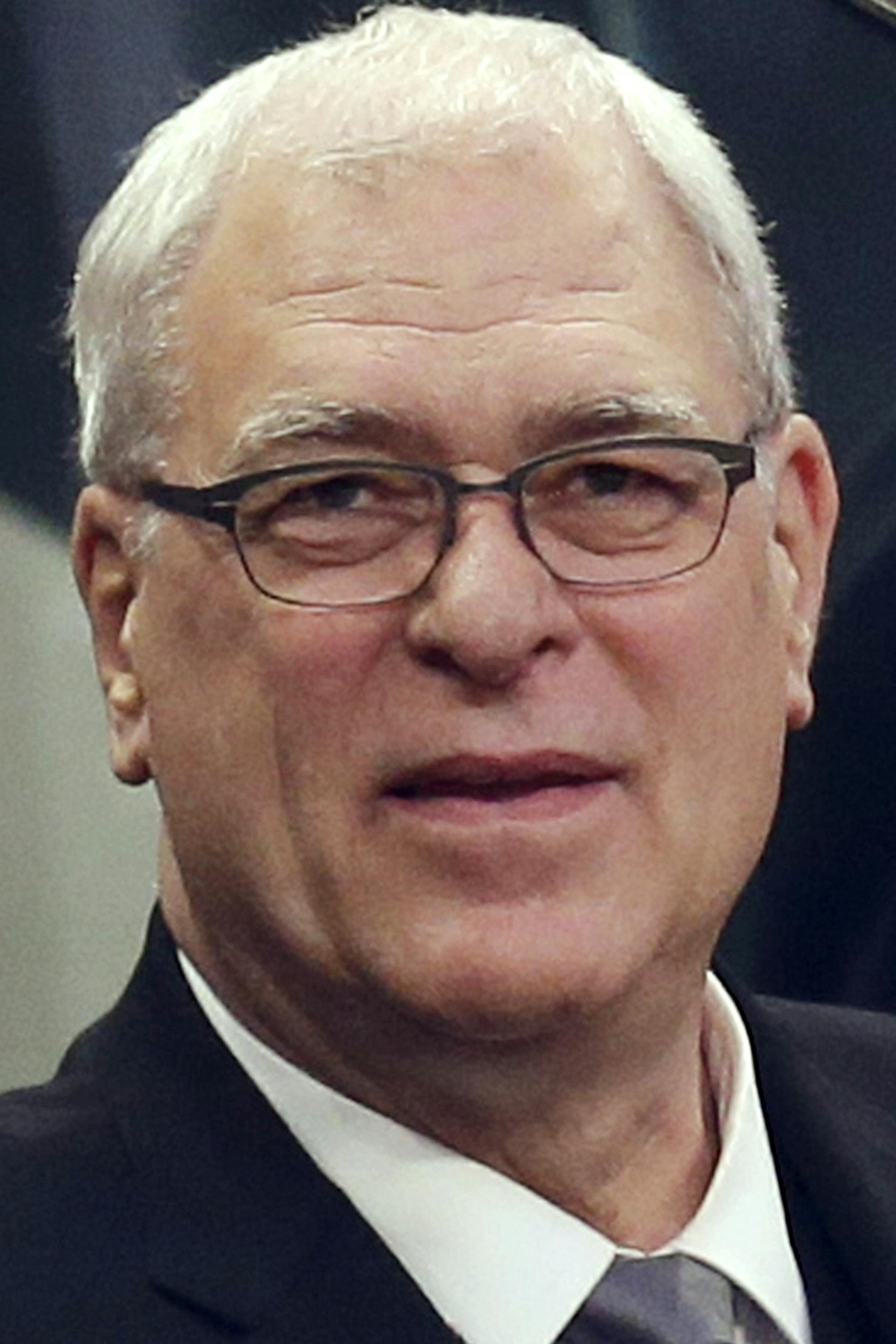 New York Knicks President Phil Jackson watches the first half of an NBA basketball game between the Knicks and the Indiana Pacers at Madison Square Garden Wednesday, March 19, 2014, in New York. The Knicks won 92-86. (AP Photo/Seth Wenig)