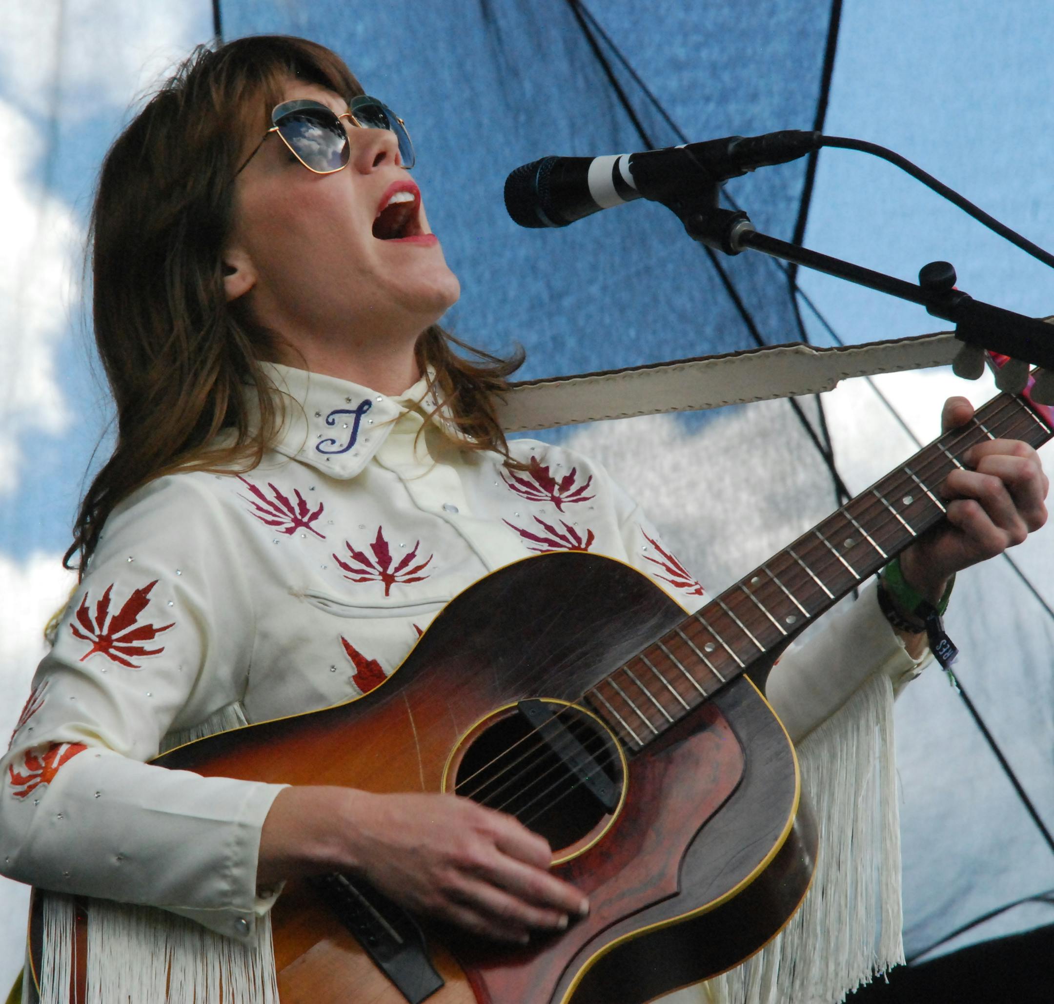 Jenny Lewis was a festival highlight -- and so was her cannabis-leaf Nudie tailored suit.
