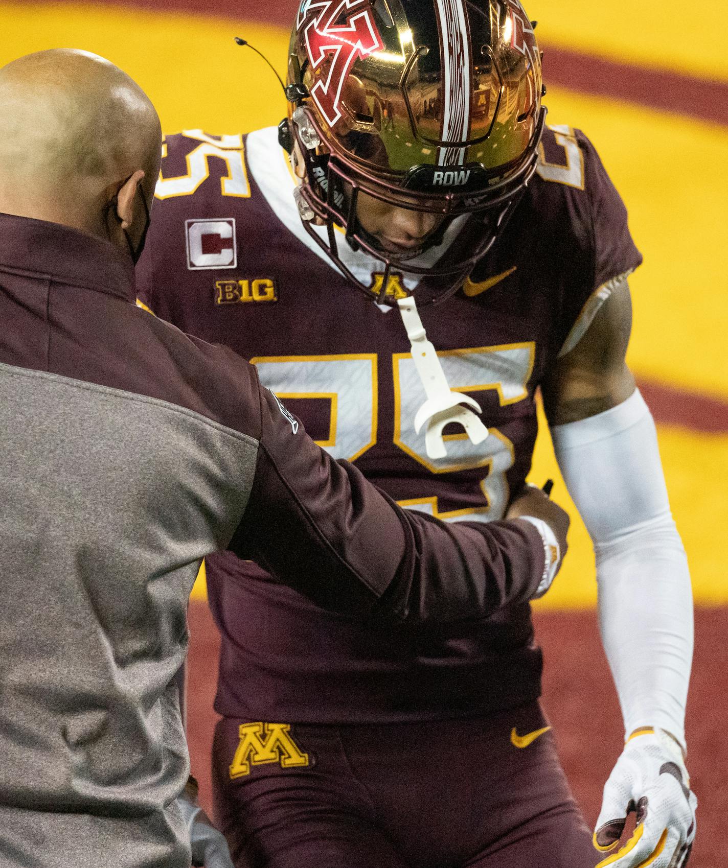 Minnesota Gophers head coach P.J. Fleck consoled defensive back Benjamin St-Juste after the team fell 24-49 to the Michigan Wolverines. ] Mark Vancleave Ð The Minnesota Gophers played the Michigan Wolverines on Saturday, Oct. 24, 2020 at TCF Bank Stadium in Minneapolis.