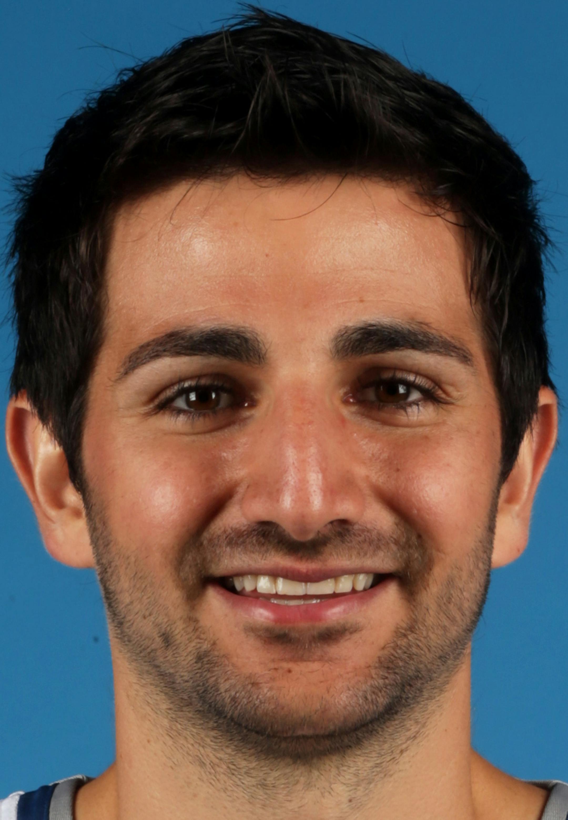 Minnesota Timberwolves' Ricky Rubio of Spain poses for media day photos Monday, Sept. 29, 2014, in Minneapolis. (AP Photo/Jim Mone) ORG XMIT: MP10