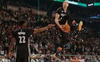 Zach LaVine, right, got assistance from fellow Wolves rookie Andrew Wiggins during the All-Star Game slam dunk competition last year.