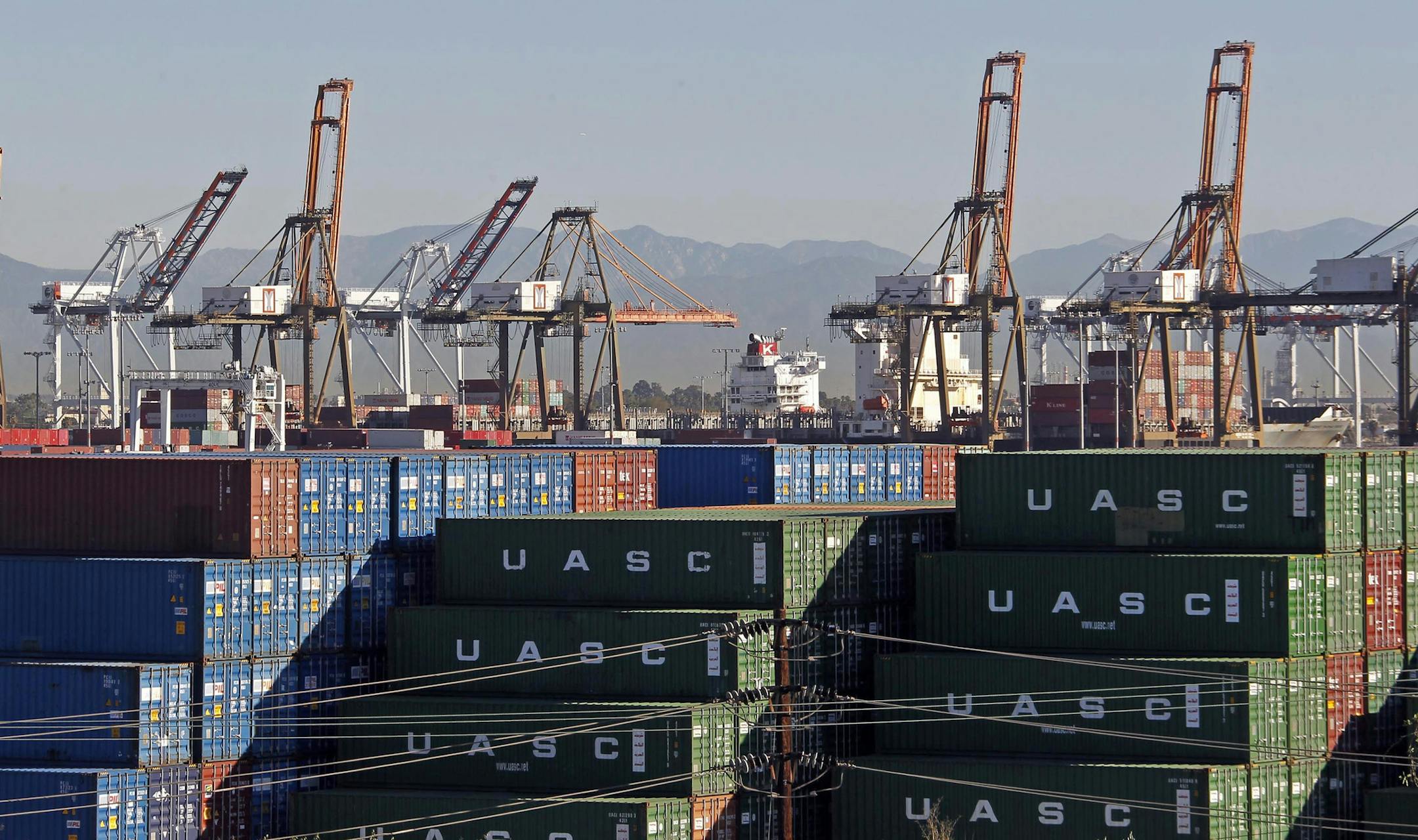 Shown is a 2015 photo of the Port of Los Angeles, one of the key cargo destinations in the U.S. (AP Photo/Nick Ut)