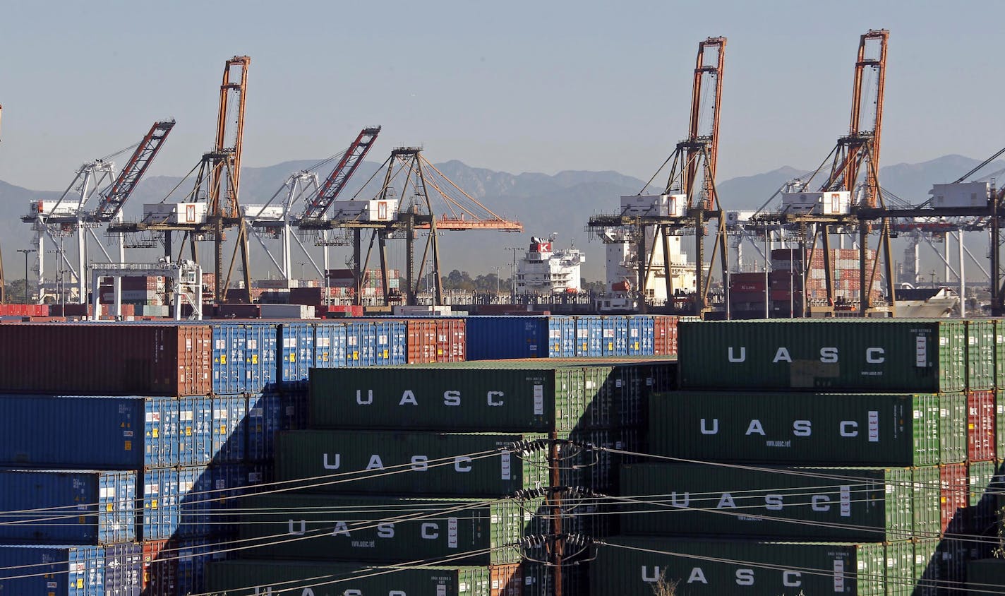 Shown is a 2015 photo of the Port of Los Angeles, one of the key cargo destinations in the U.S. (AP Photo/Nick Ut)