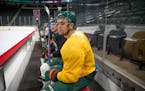 Wild left wing Jordan Greenway watched team drills prior to Game 1 of the playoffs.