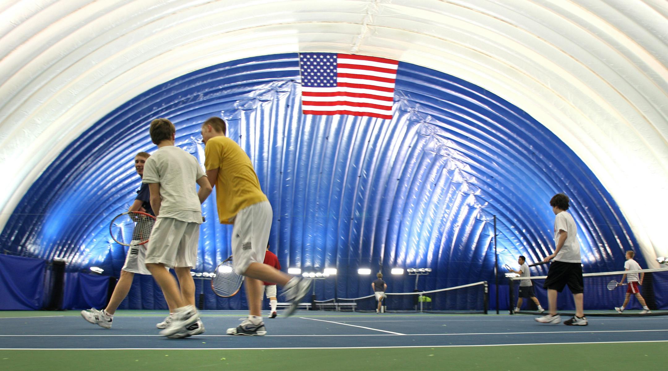 High school students from Blaine, Coon Rapids, Centennial, Anoka and Roseville practiced after school at the PublicIndoorTennis.com dome in Spring Lake Park. The owner is former Centennial coach Tim Jachymowski.