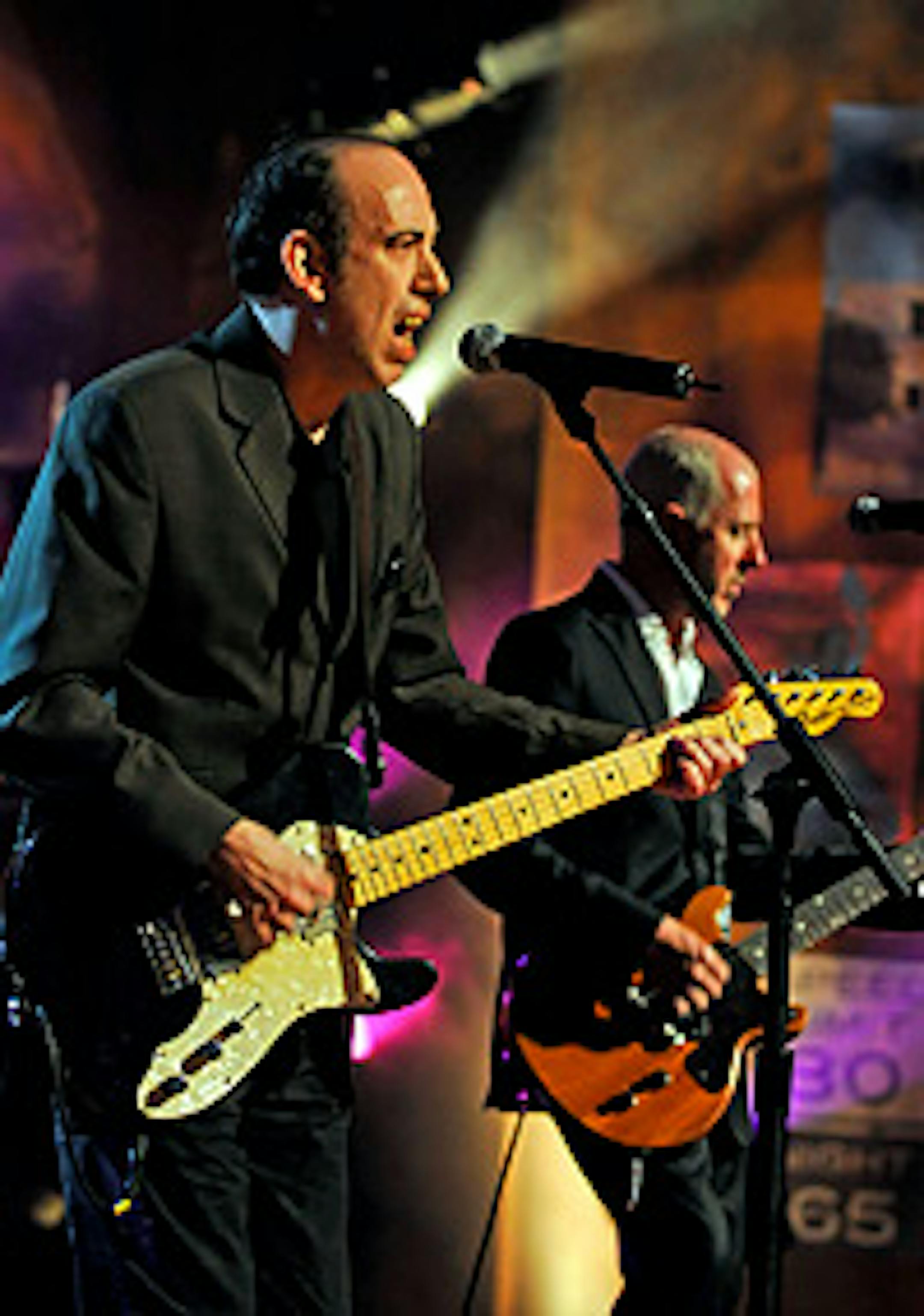 Mick Jones and Tony James, right, performed at South by Southwest with Carbon/Silicon bassist Leo Williams (hidden and drummer Dominic Greensmith (hidden).
