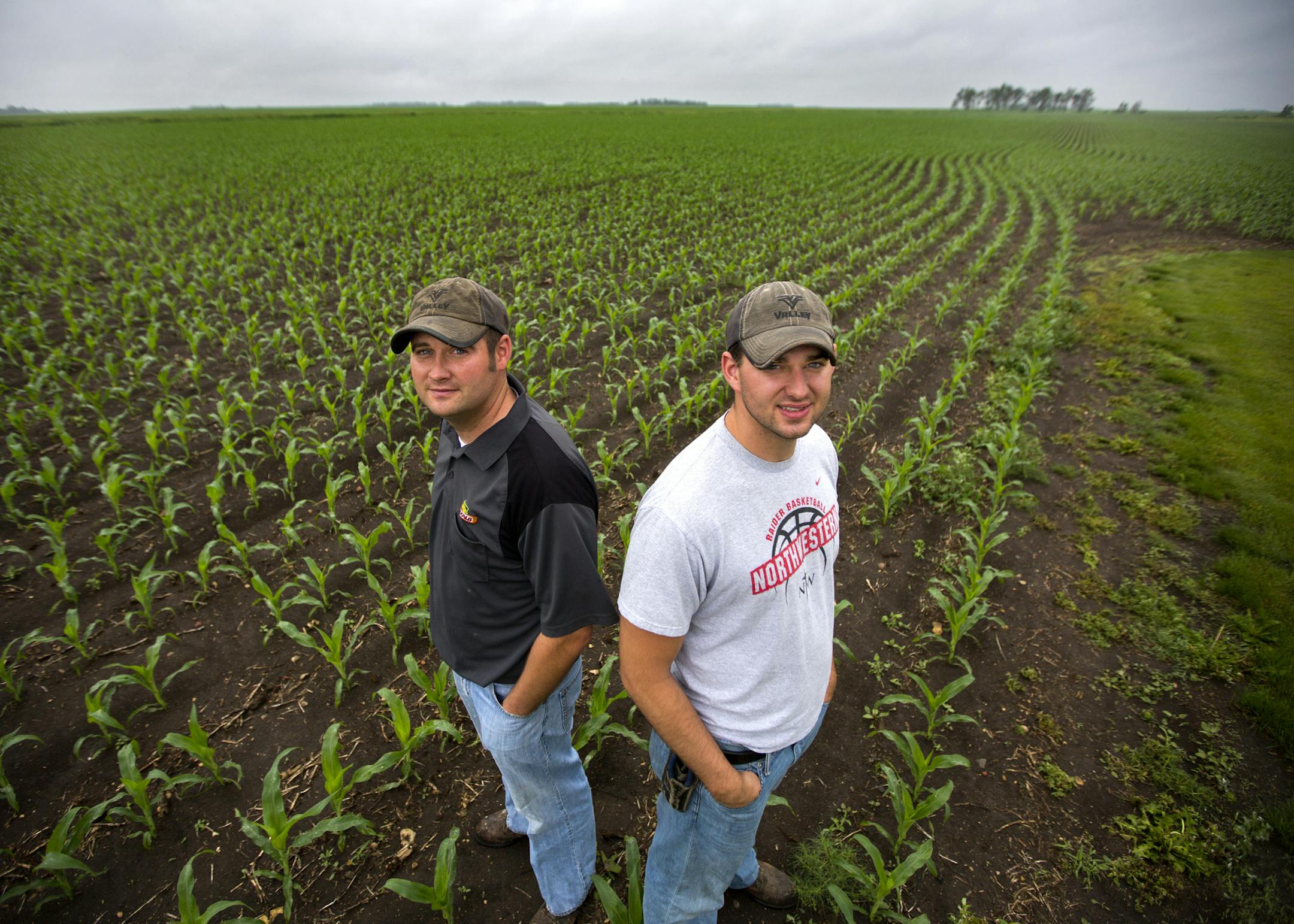For four generations, the Van Hulzen family have farmed land south Egerton. Here Ross and Reed Van Hulzen stand near some of their 6,000 acres of corn and beans. ] In the small town of Edgerton where a shallow aquifer readily absorbs leaching farm chemicals, residents pay extra every month for special treatment to make their water safe to drink. The nitrate-removal system -- now woven into the infrastructure of this heavily Dutch settlement - reflects the dilemma that a number of communities are