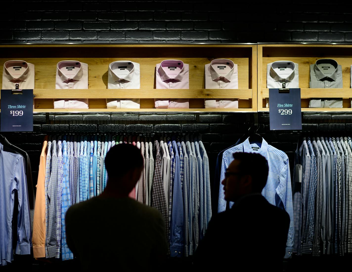 Indochino manager Jeremy Thao, right, helped Max Dibrell, of St. Louis Park, select shirts Wednesday night after a custom fitting. ] AARON LAVINSKY &#xef; aaron.lavinsky@startribune.com Millennial men have shown more interest in looking dapper than their fathers or grandfathers. That explains why a chain of made-to-measure stores called Indochino has started opening around the country, including Mall of America. With a made to measure suit starting at $379 and shirts at $79, prices aren't that f