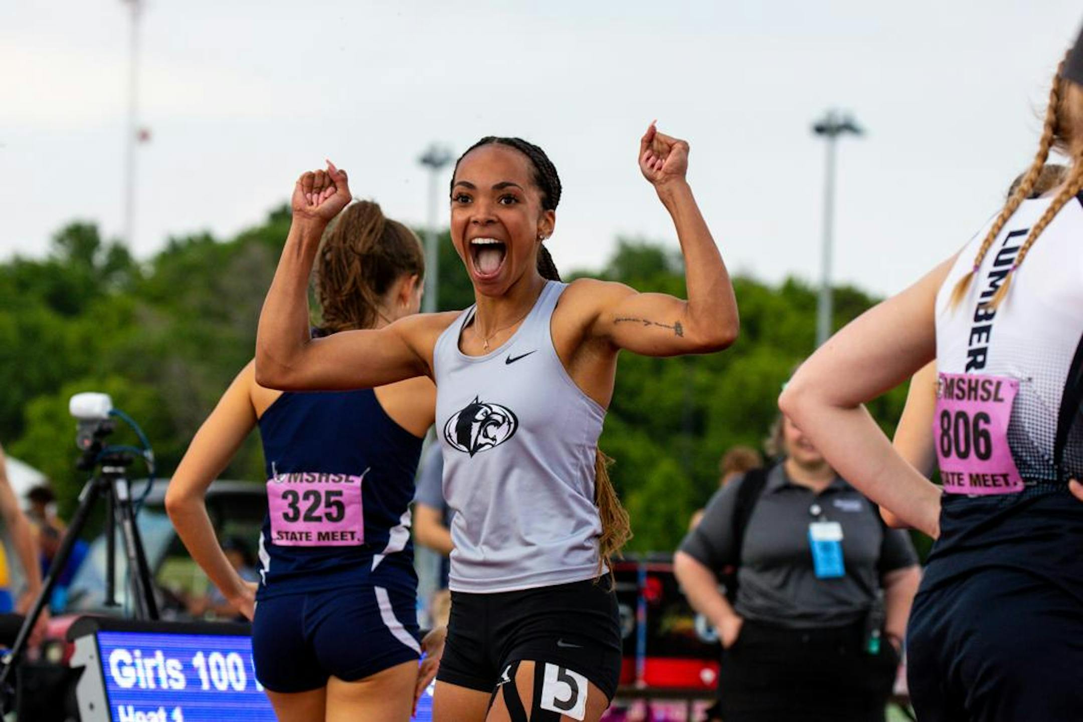 Ava Fitzgerald of Roseville Area High School celebrates after setting a statewide all-time record for the 100m hurdles dash during the Minnesota Class 3A track and field state finals at St. Michael-Albertville High School in St. Michael, Minnesota.