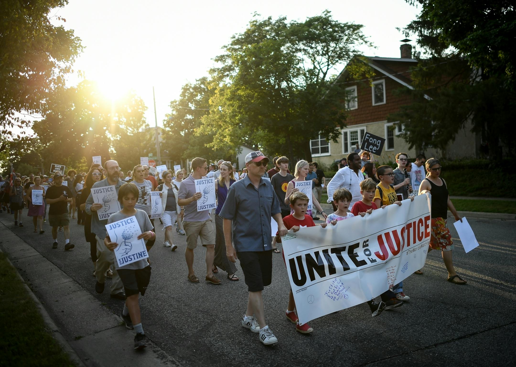 Hundreds marched from the site of Justine Damond's shooting to Beard's Plaissance Park during the Peace and Justice March for Justine Thursday night.