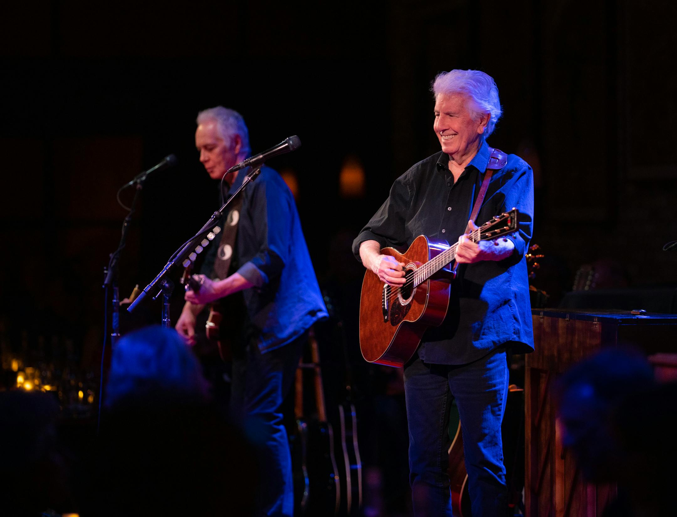 Graham Nash performing with guitarist Shane Fontayne, left, early in his set at the Dakota.