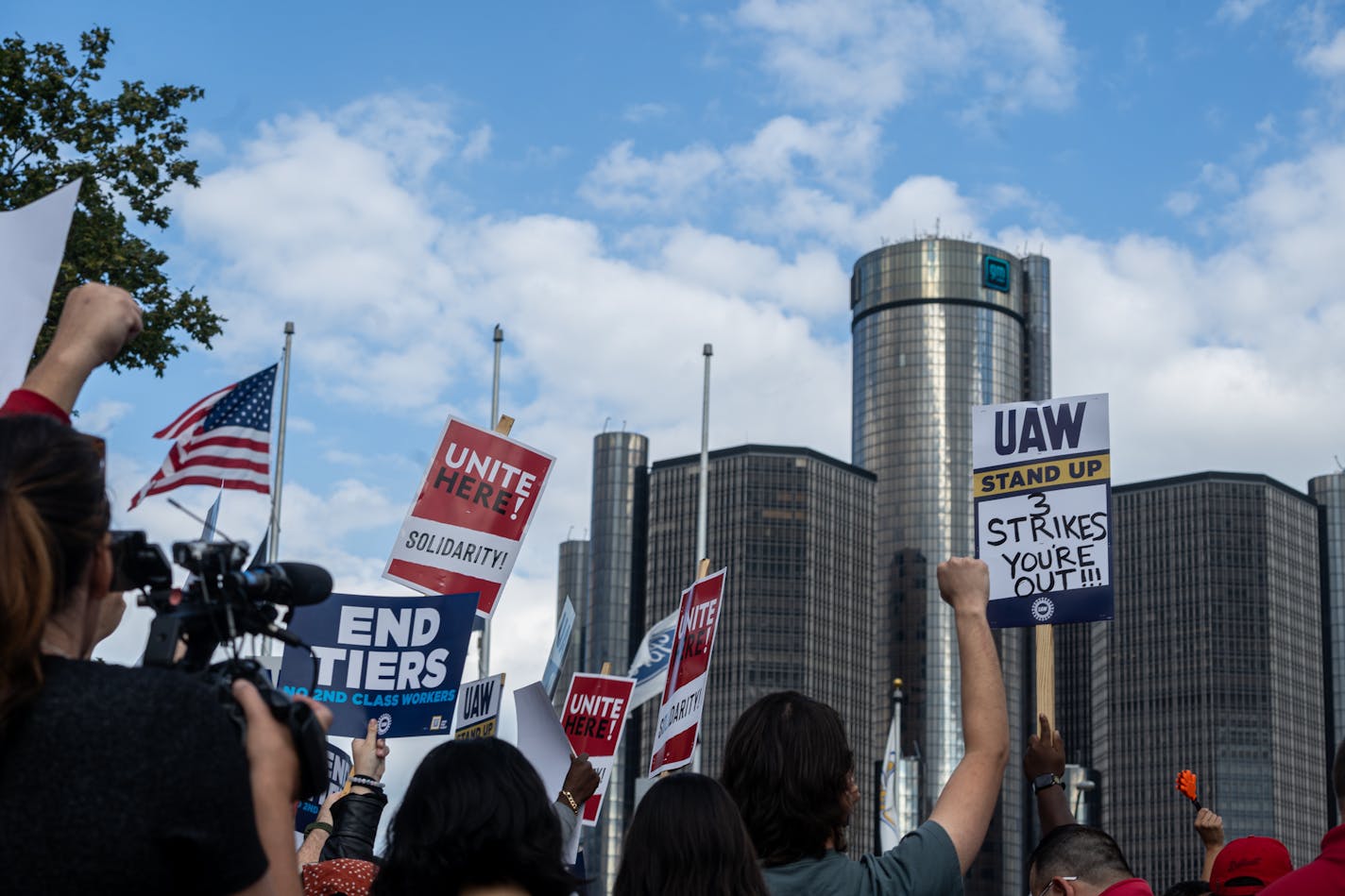 Striking UAW autoworkers demonstrated at a rally in downtown Detroit on Friday, Sept. 15, 2023. Members of the UAW began a strike Friday at three plants in the Midwest, walking out amid a contract dispute over pay, pensions and work hours at the three Detroit automakers. (Cydni Elledge/The New York Times)