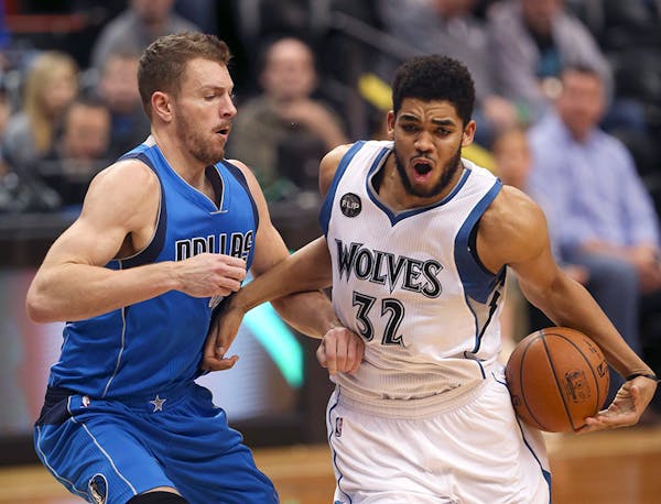 Timberwolves center Karl-Anthony Towns was fouled in the second quarter by Mavericks forward David Lee Sunday afternoon.