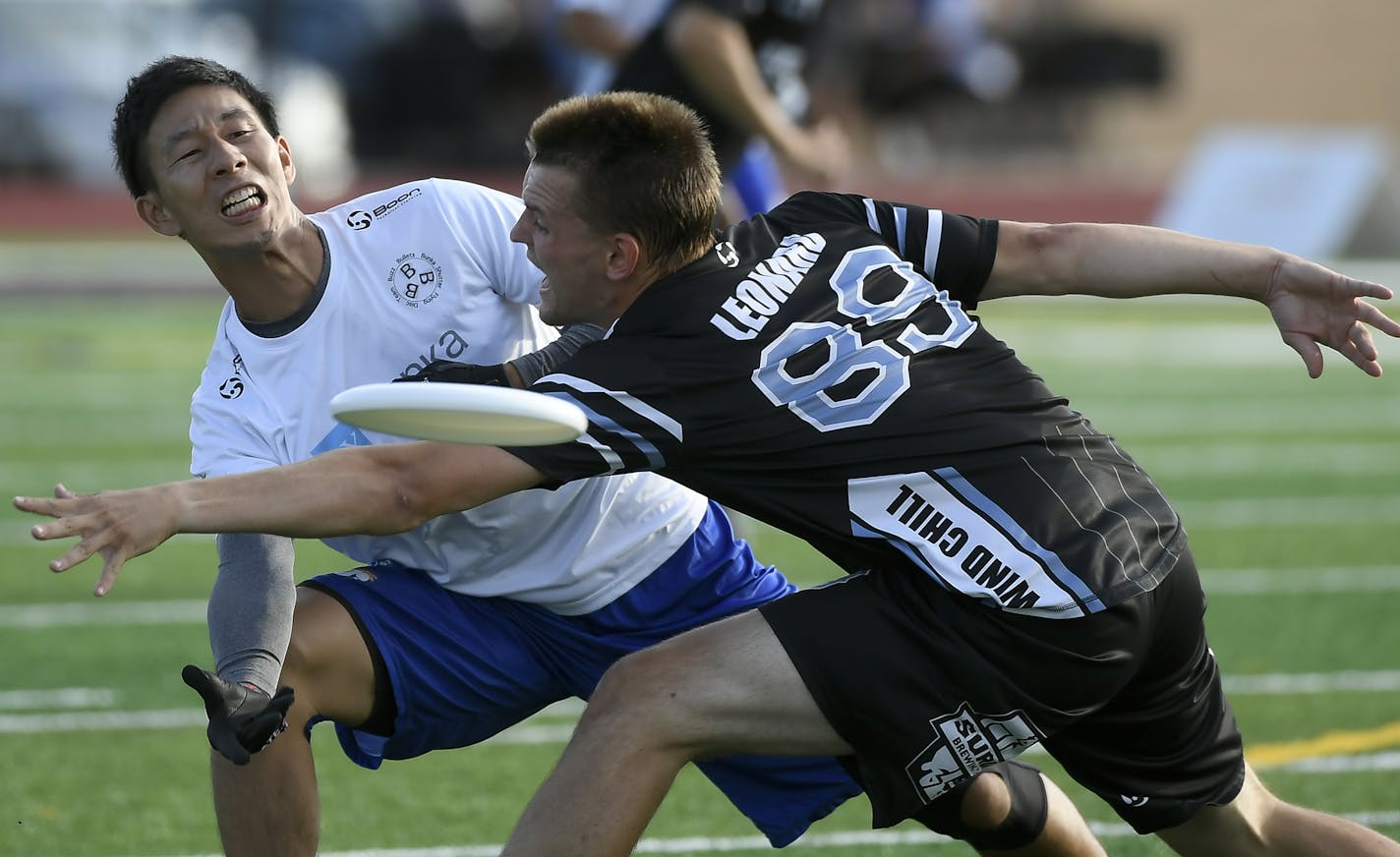 The Buzz Bullets' Masahi Kurono passed the frisbee through the defense of the Minnesota Wind Chill's Isaac Leonard during their match Wednesday night. ] Aaron Lavinsky &#xa5; aaron.lavinsky@startribune.com The Minnesota Wind Chill, that state's semi-professional ultimate frisbee team, played the Buzz Bullets, a Japanese team, in their International Showcase held Wednesday, July 31, 2019 at Sea Foam Stadium in St. Paul, Minn.