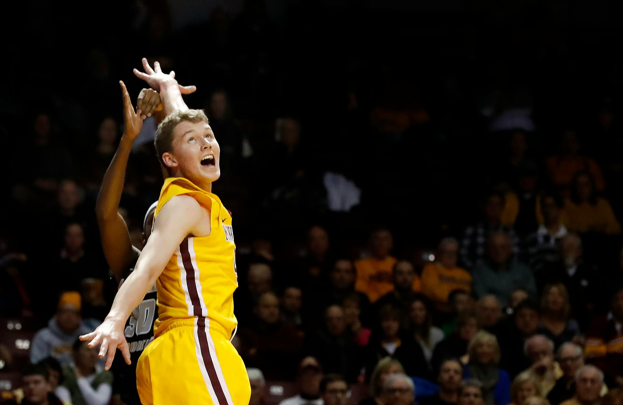 Michael Hurt (42) attempted to block a shot by Ashtyn Bradley (30) in the first half. ] CARLOS GONZALEZ cgonzalez@startribune.com - December 14, 2016, Minneapolis, MN, University of Minnesota Gophers