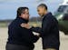President Barack Obama is greeted by New Jersey Gov. Chris Christie upon his arrival at Atlantic City International Airport, Wednesday, Oct. 31, 2012,