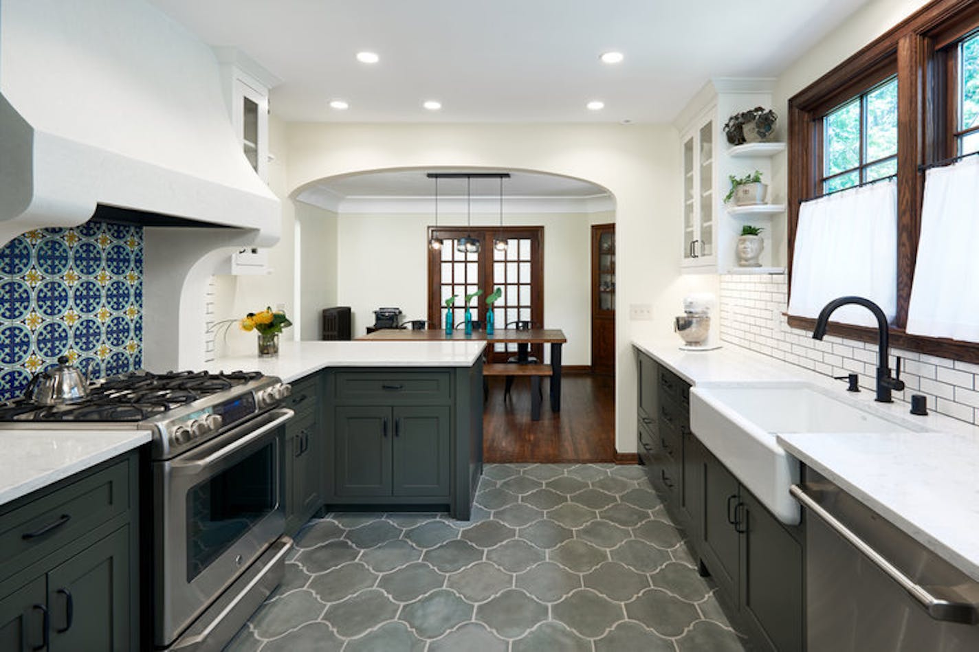 Karen and Mark Swoverland wanted their kitchen to highlight the house's Spanish Revival influences and chose elements accordingly.